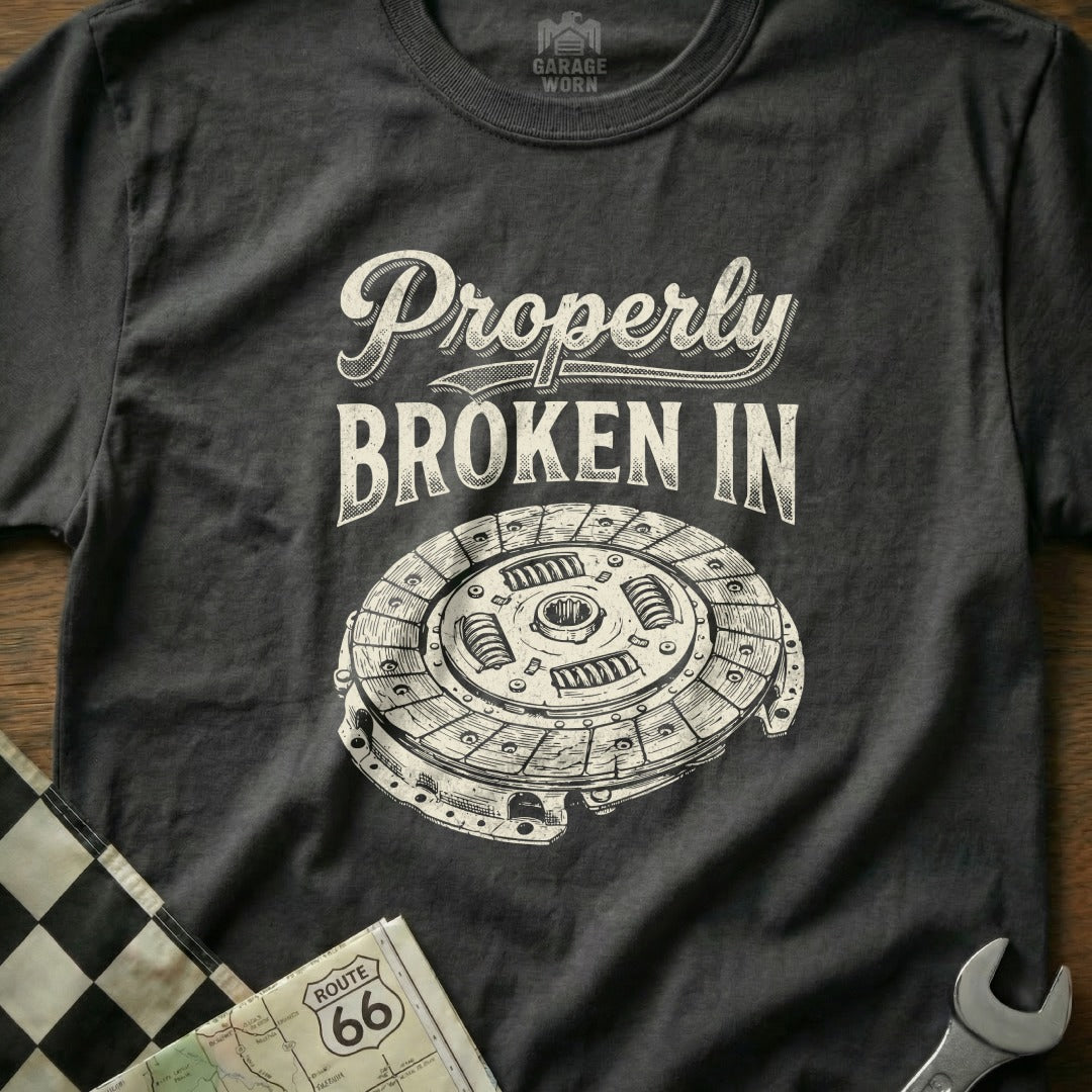 Dark t-shirt with "Properly Broken In" and clutch plate graphic.
