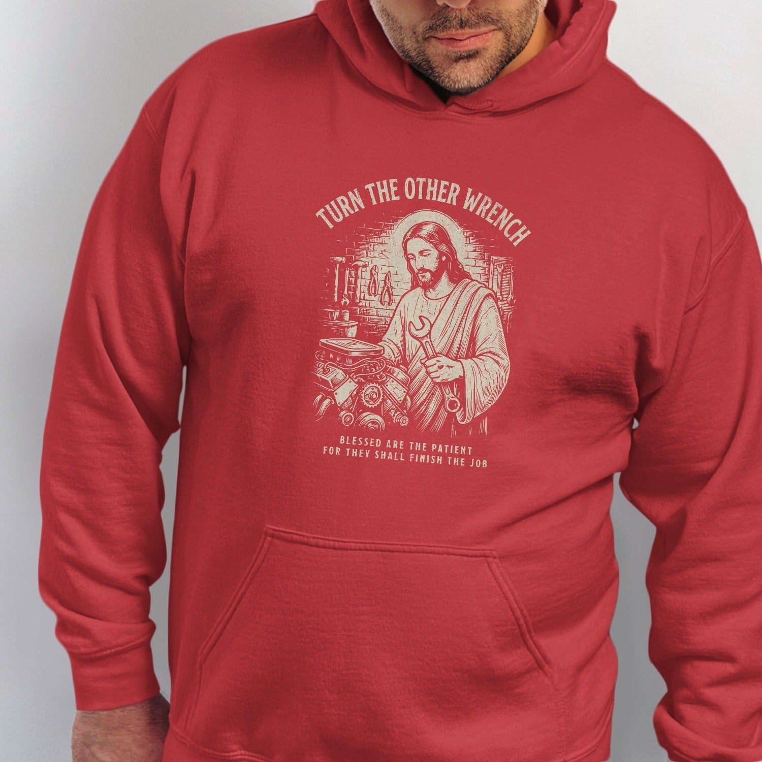 Jesus holding a wrench with text "Turn the other wrench".