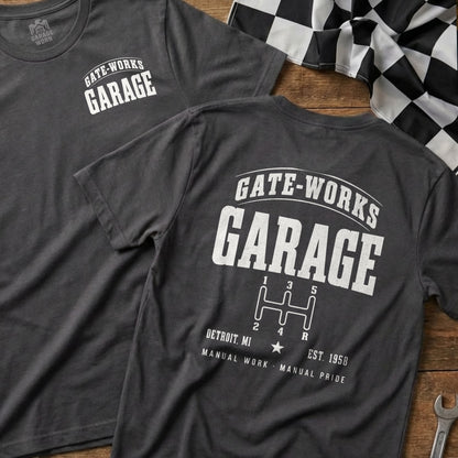Dark grey t-shirt with "Gate-Works Garage" and a manual transmission graphic.