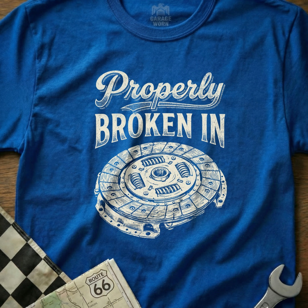 Blue t-shirt with "Properly Broken In" text and clutch assembly graphic.