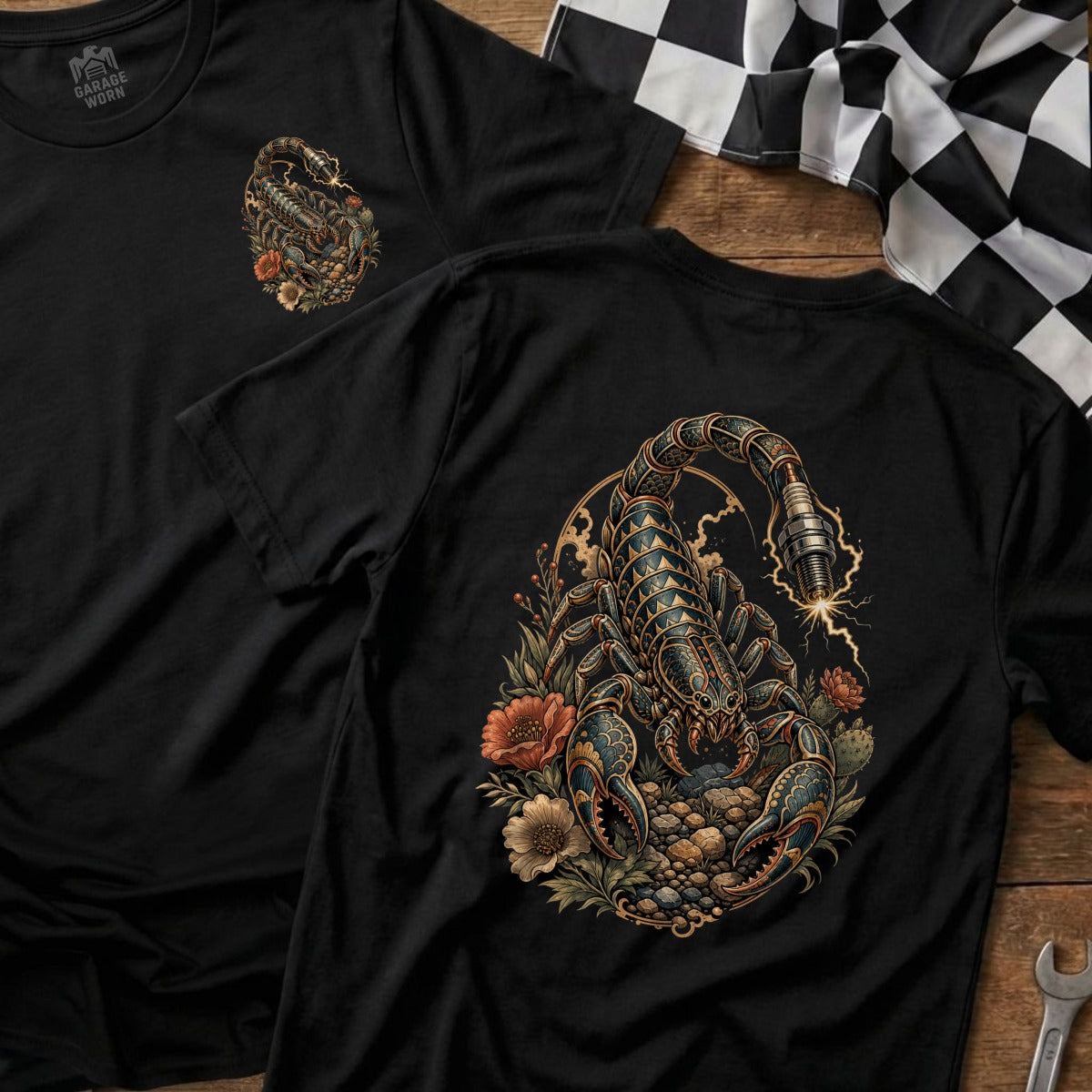 Black t-shirt with a detailed scorpion and floral design on the back.
