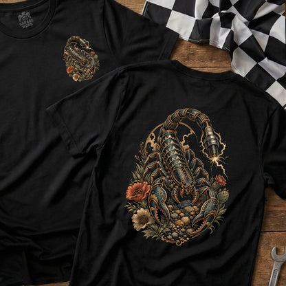 Black t-shirt with a detailed scorpion and floral design on the back.