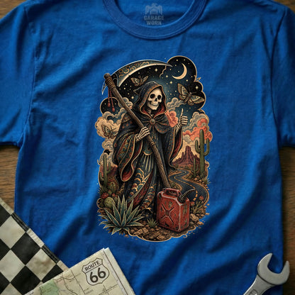 Grim Reaper with scythe and gas can in desert landscape on blue t-shirt.