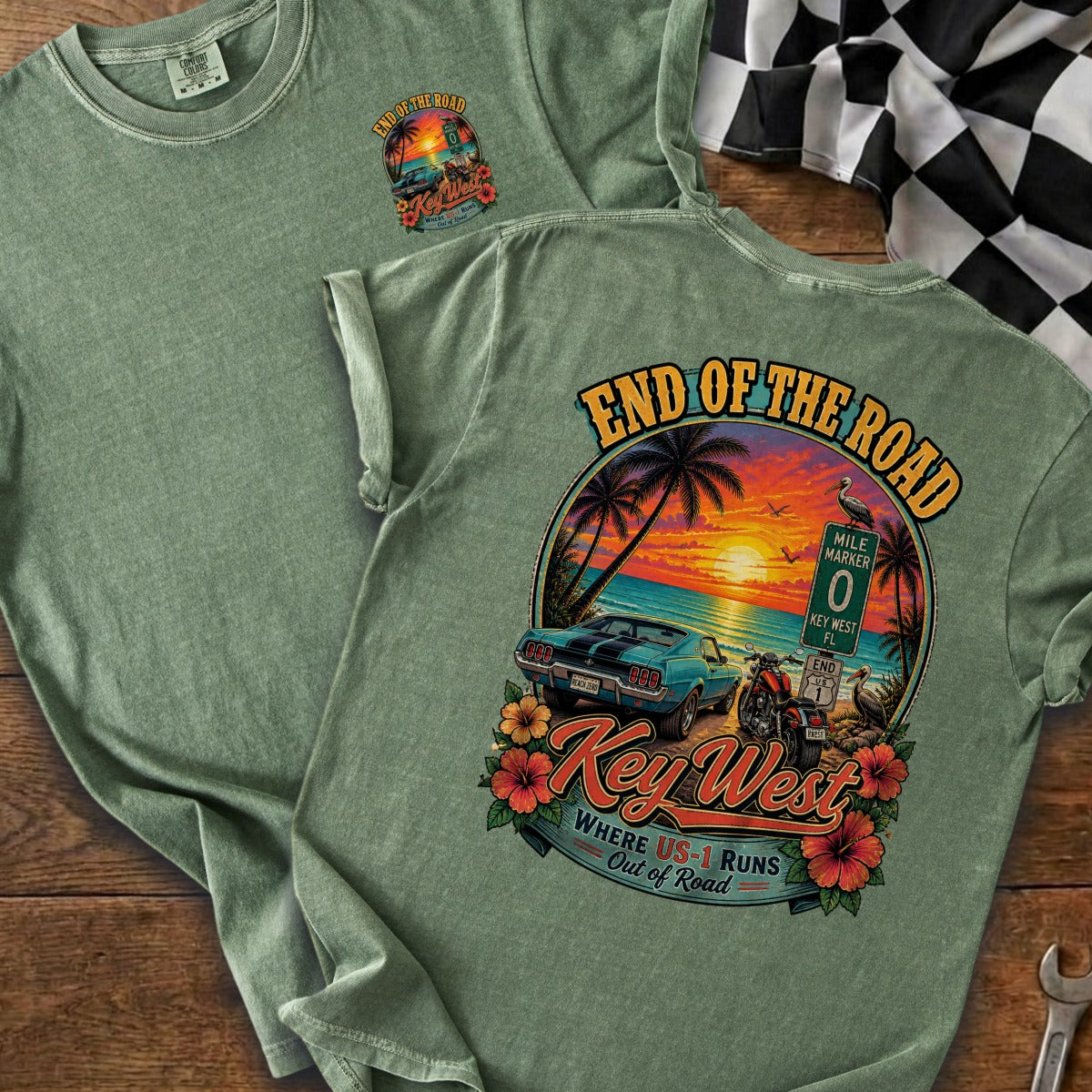 Seafoam green t-shirt with Key West sunset graphic featuring a classic car and motorcycle.