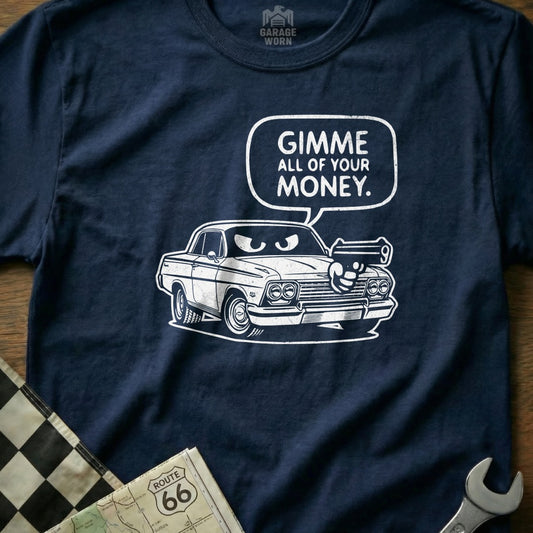 Navy t-shirt with a cartoon car and a gun in a speech bubble saying "Gimme all of your money."