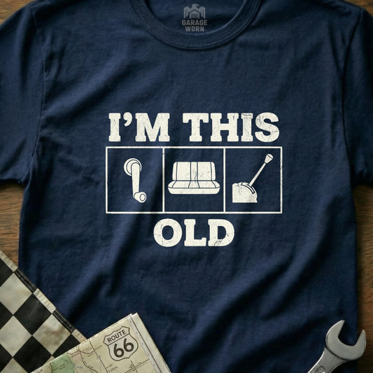 T-shirt with "I'm This Old" and car part icons: gear shift, steering wheel, gas pedal.
