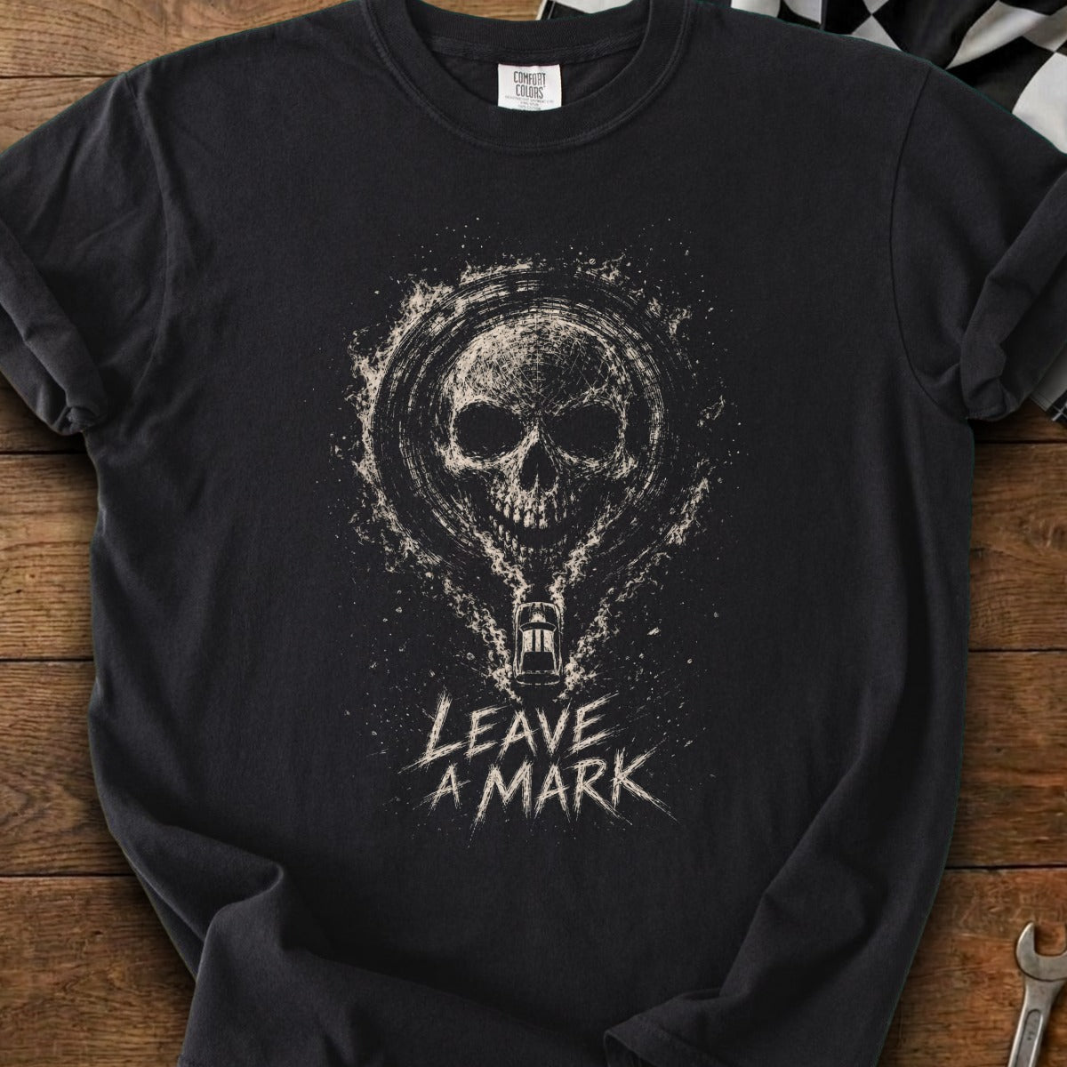 Black t-shirt with skull graphic and "Leave a Mark" text.