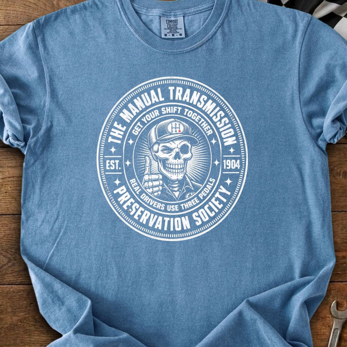 Manual Transmission Preservation Society design with a skeleton giving a thumbs-up.