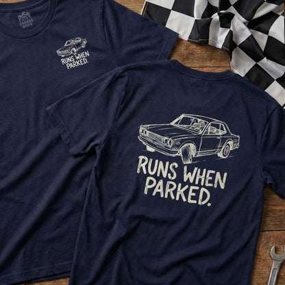 Navy t-shirt with "RUNS WHEN PARKED" text and vintage car graphic.