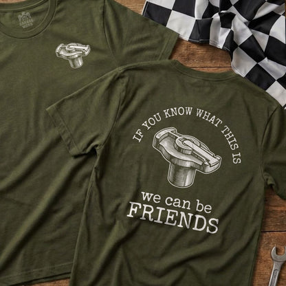 Green t-shirts with a cap emblem and "If you know what this is we can be friends" text.
