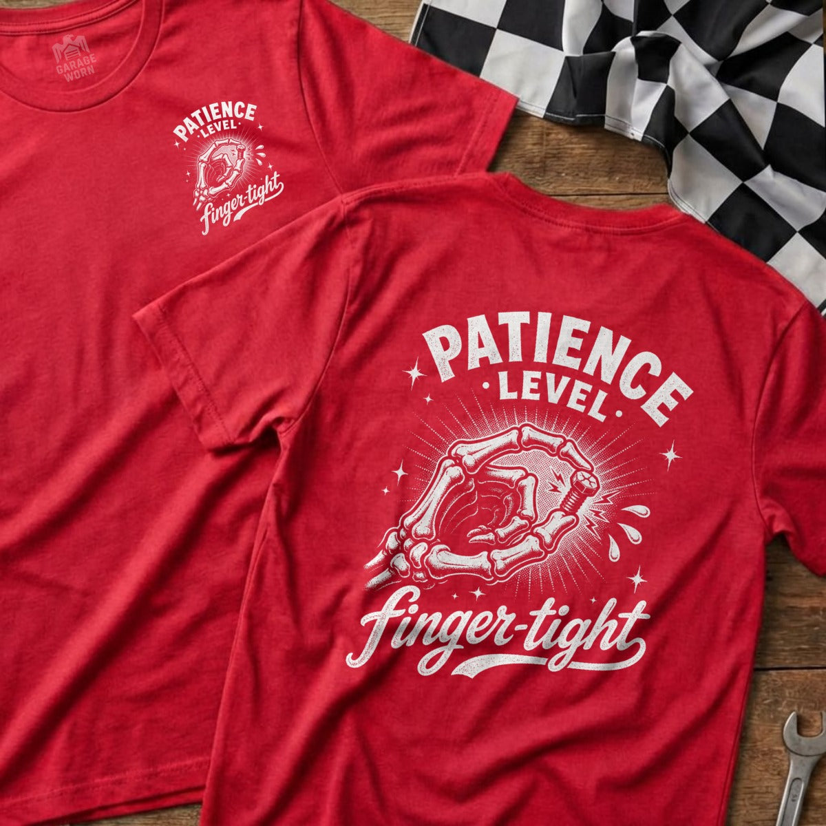 Red t-shirt with graphic of skeleton hand tightening bolt, text "Patience Level Finger-tight".