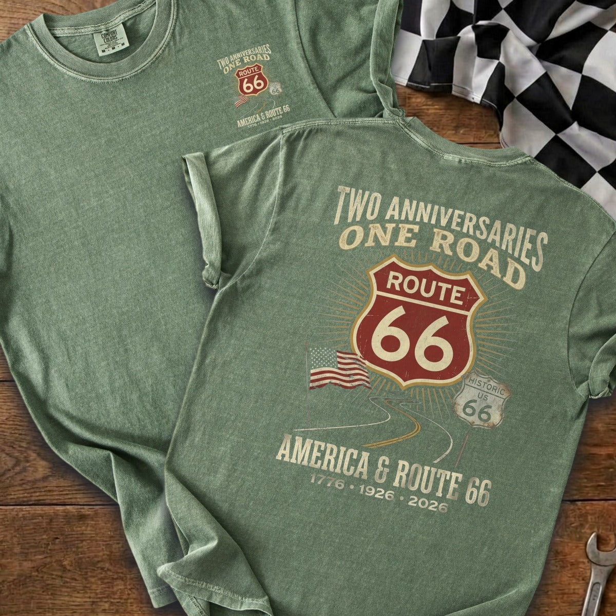 Green t-shirt with Route 66 "Two Anniversaries, One Road" graphic.