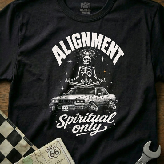 T-shirt graphic with skeleton meditating on car, "Alignment Spiritual Only".