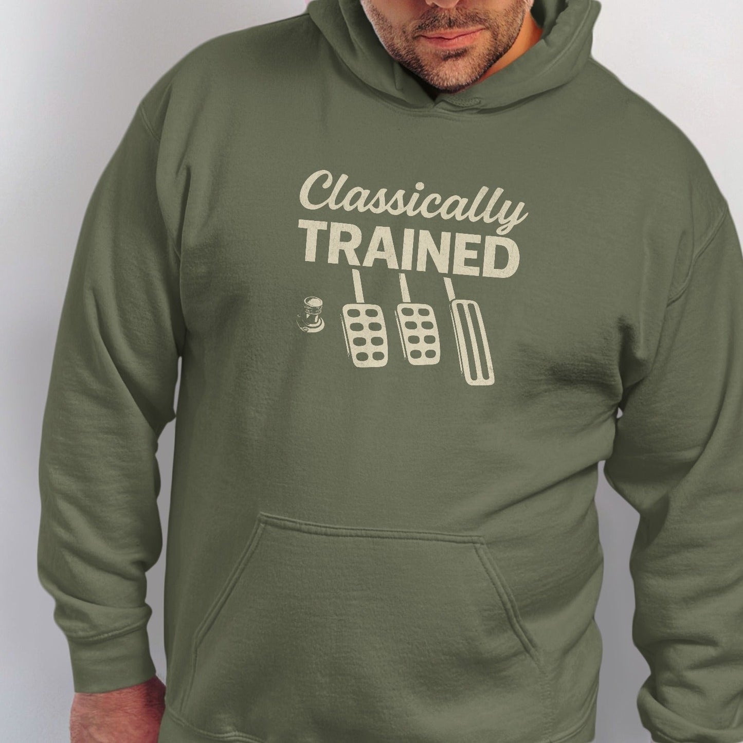 Olive green hoodie with "Classically TRAINED" and car pedals graphic.