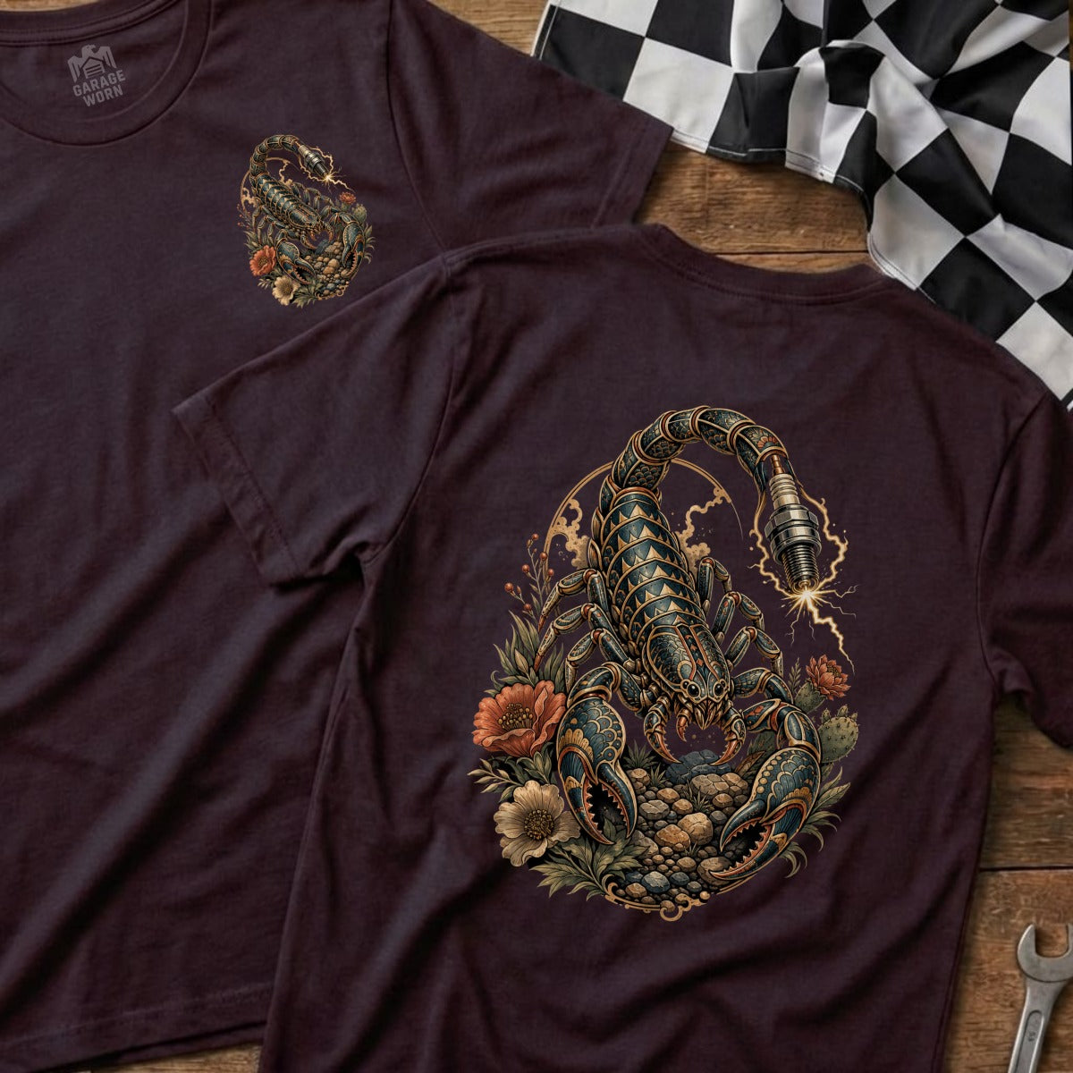T-shirt features a scorpion with a spark plug tail surrounded by flowers.