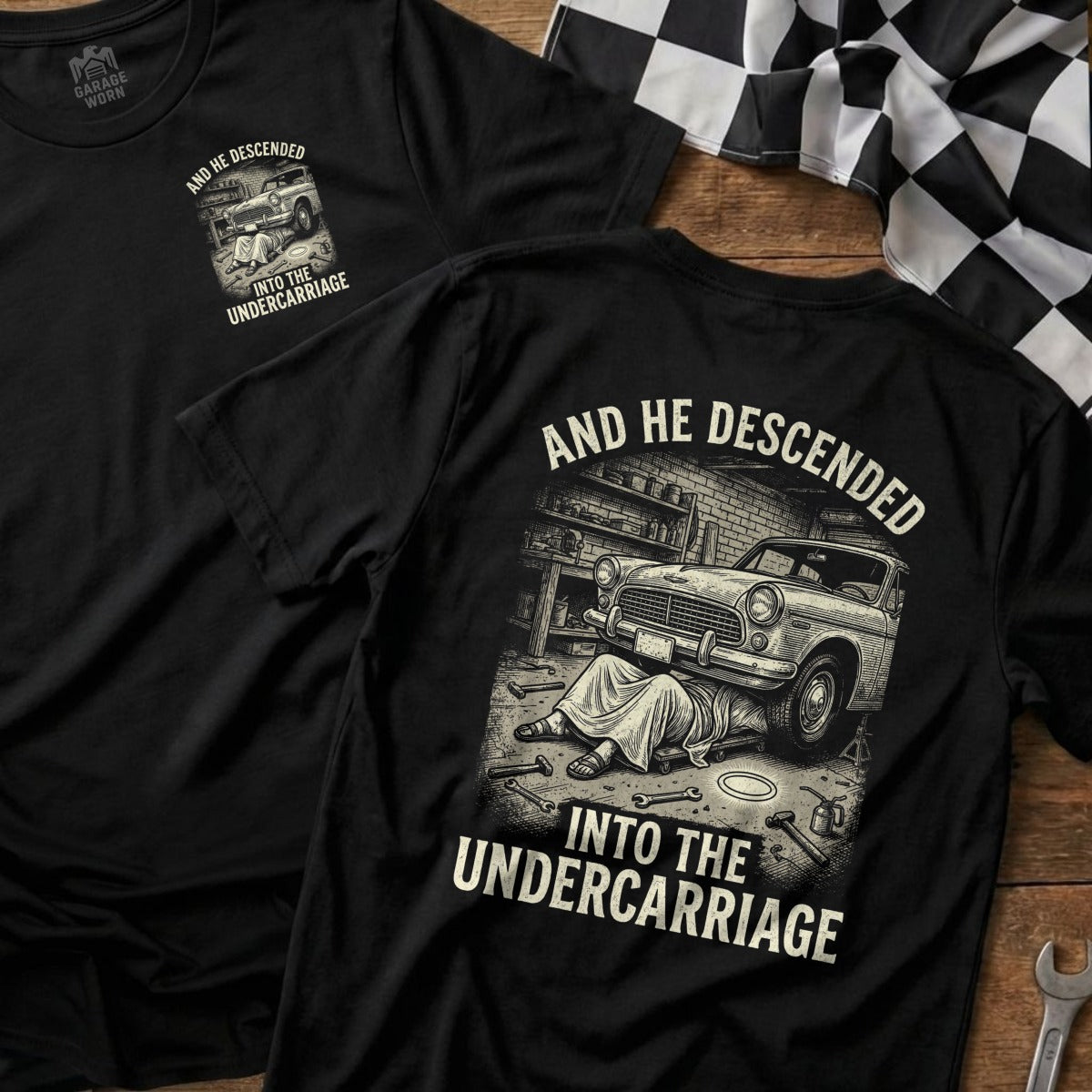 T-shirt with "And he descended into the undercarriage" text and graphic.