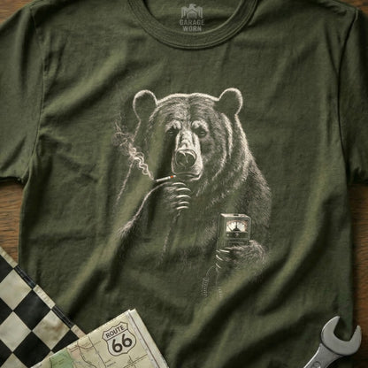 Bear smoking cigarette holding gauge on olive green t-shirt.