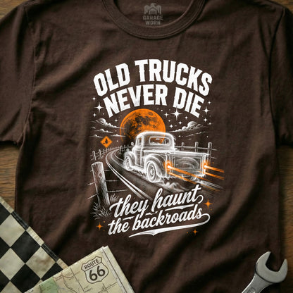 Brown t-shirt with "Old Trucks Never Die" and a vintage truck on a road.