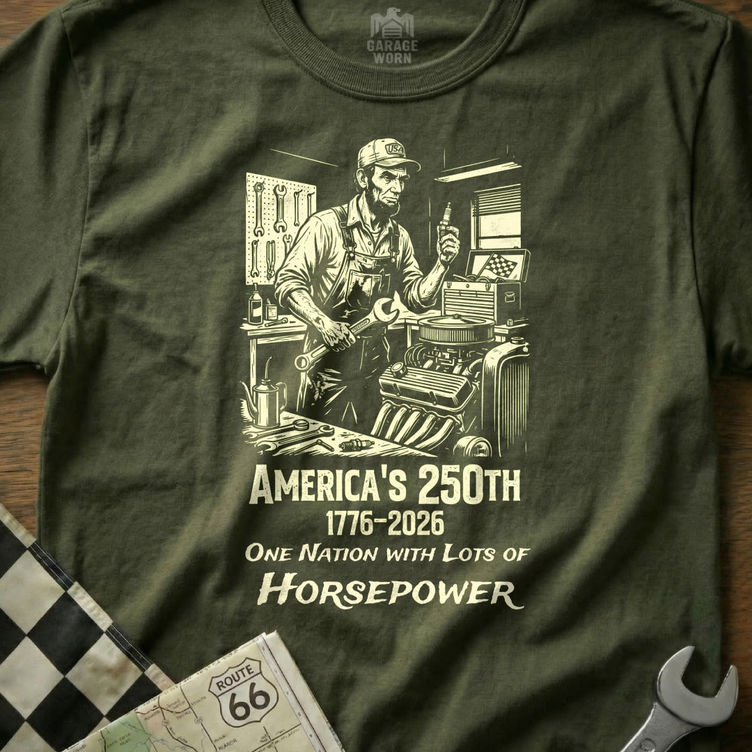 T-shirt with mechanic and engine text: America's 250th, 1776-2026, One Nation with Lots of Horsepower.