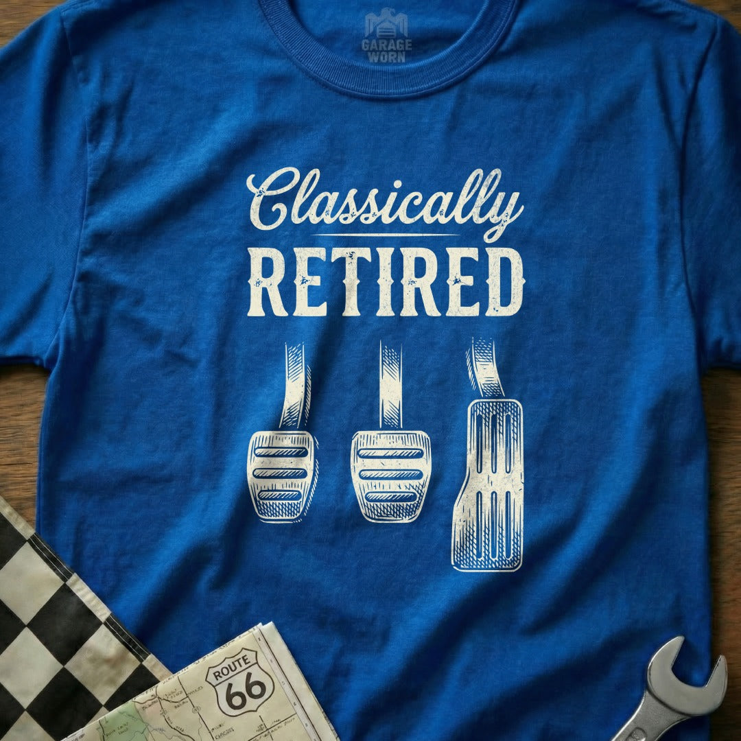 Blue t-shirt with "Classically RETIRED" text and three car pedals.