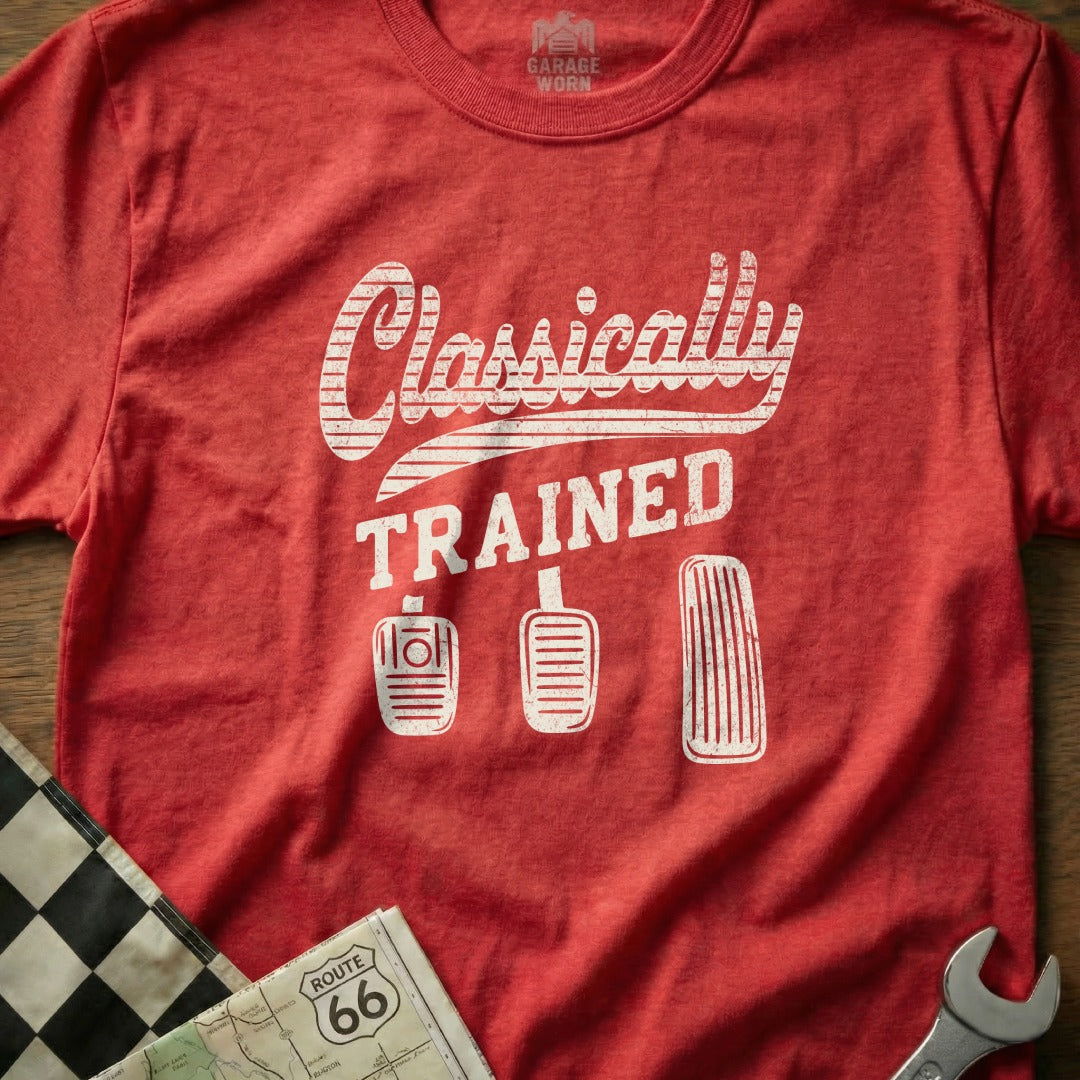 Red t-shirt with "Classically TRAINED" text and car pedals graphic.