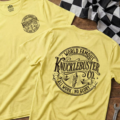 Yellow t-shirts with "Knucklebuster" logo and "All Work No Glory" slogan.
