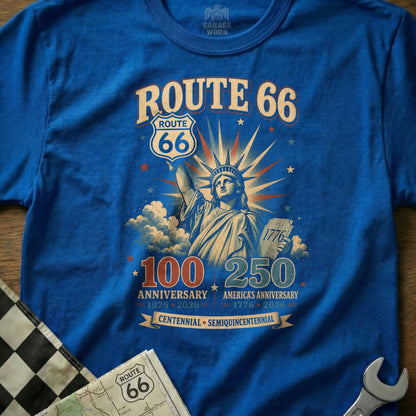 Blue t-shirt with Statue of Liberty and Route 66 logos celebrating anniversaries.