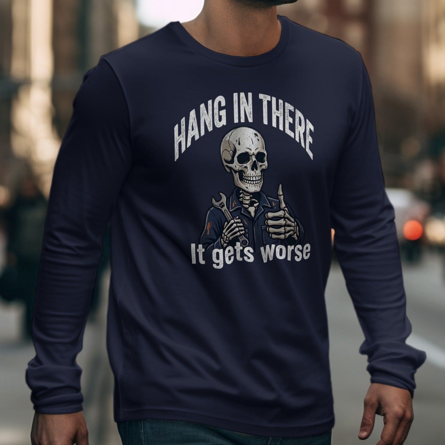 Dark blue long-sleeved shirt with a skeleton graphic saying "Hang In There. It gets worse."