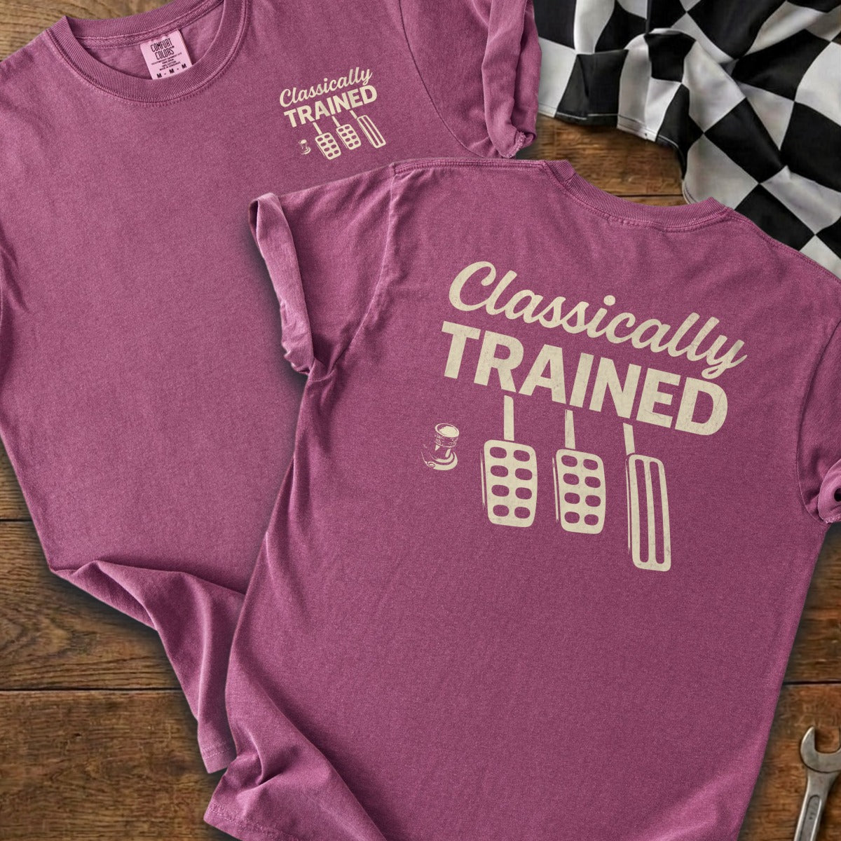 Two purple t-shirts display "Classically TRAINED" and three pedals graphic.