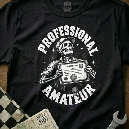 Black t-shirt with skeleton wearing a hat holding a certificate, text Professional Amateur.