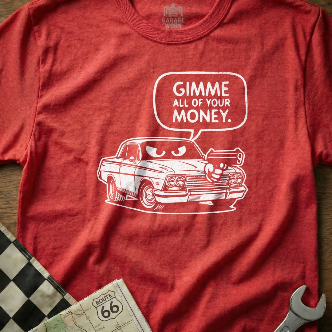 Red t-shirt with cartoon car holding a gun and saying "Gimme all of your money."