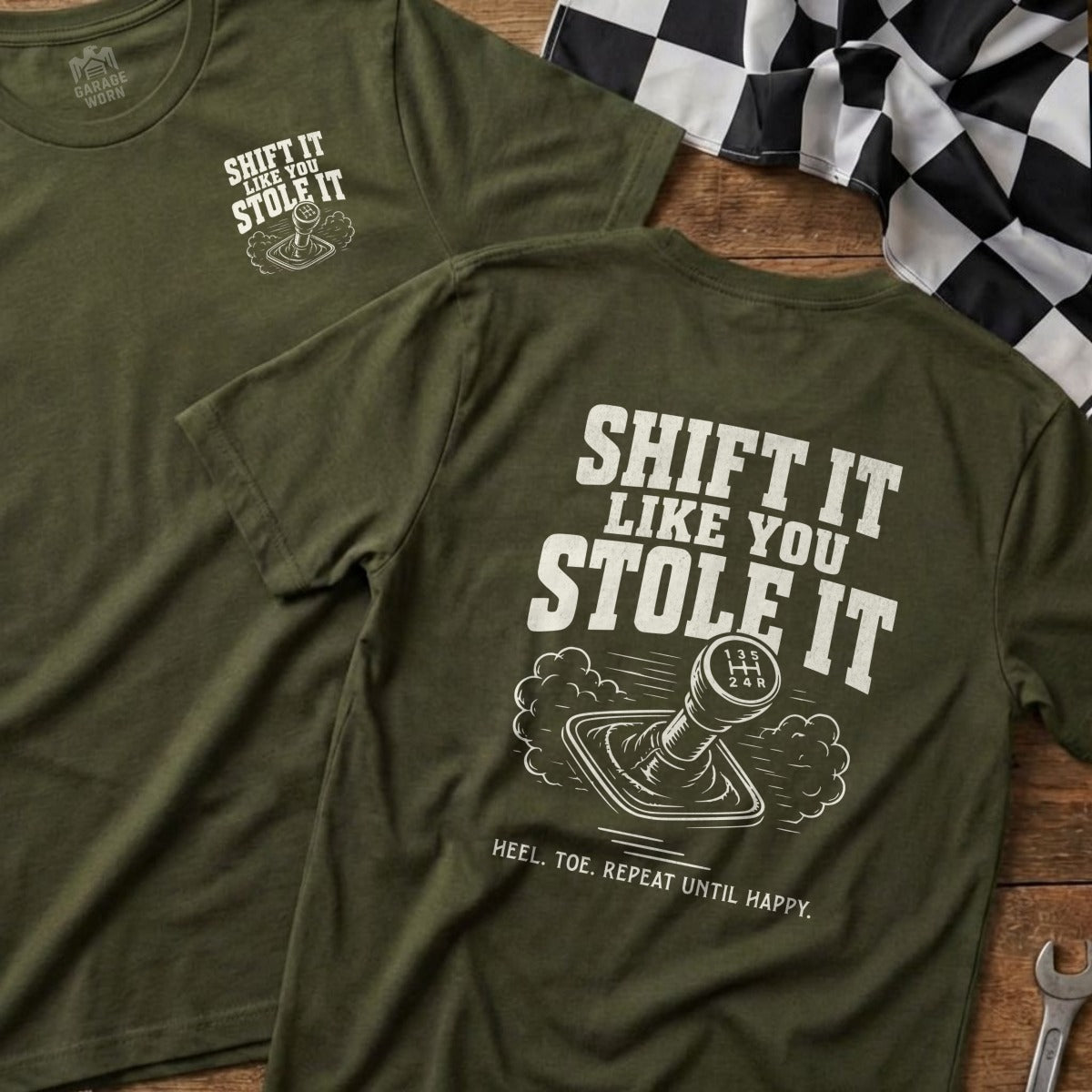 Olive green t-shirt with "Shift it like you stole it" graphic and gear shift.