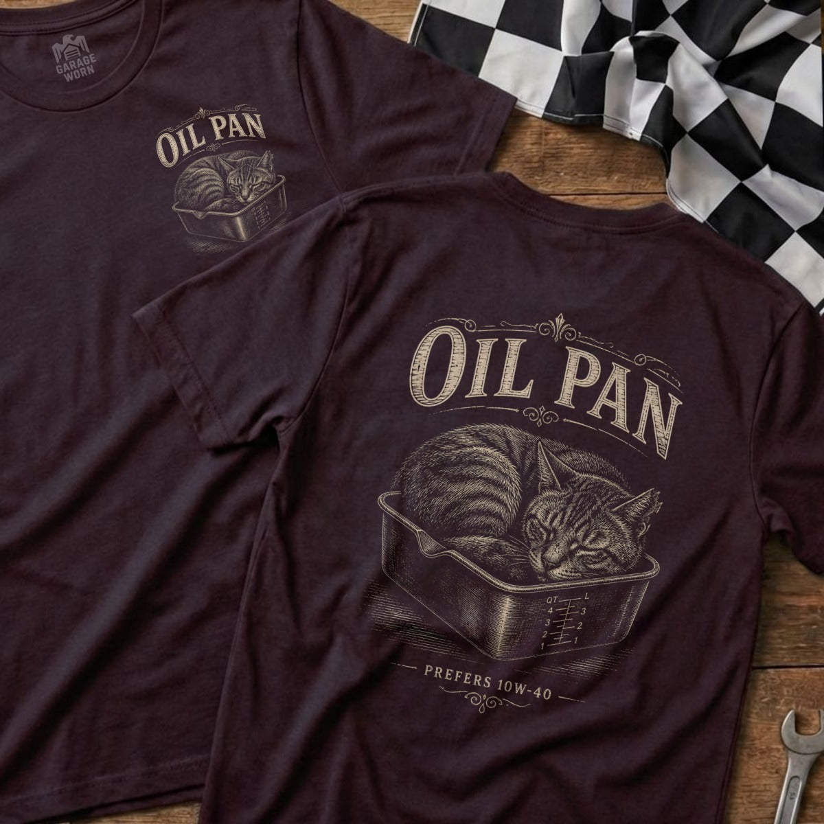 Dark maroon t-shirt with vintage "Oil Pan" graphic of a cat sleeping in a pan.