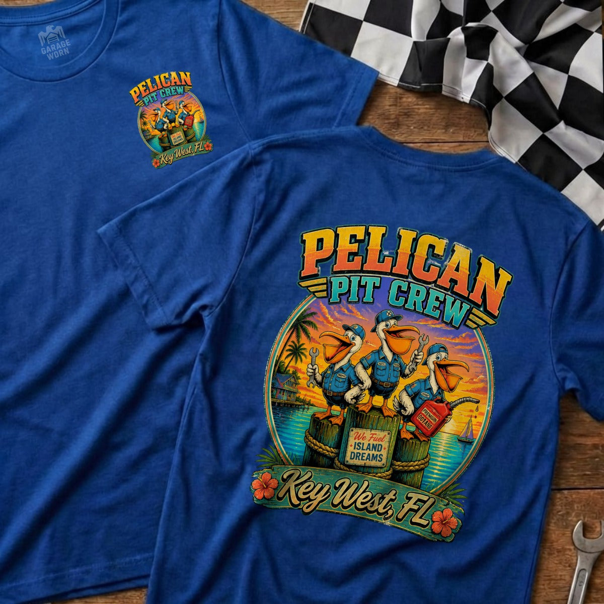 Blue t-shirt featuring pelicans labeled "Pelican Pit Crew We Fuel Island Dreams Key West, FL."