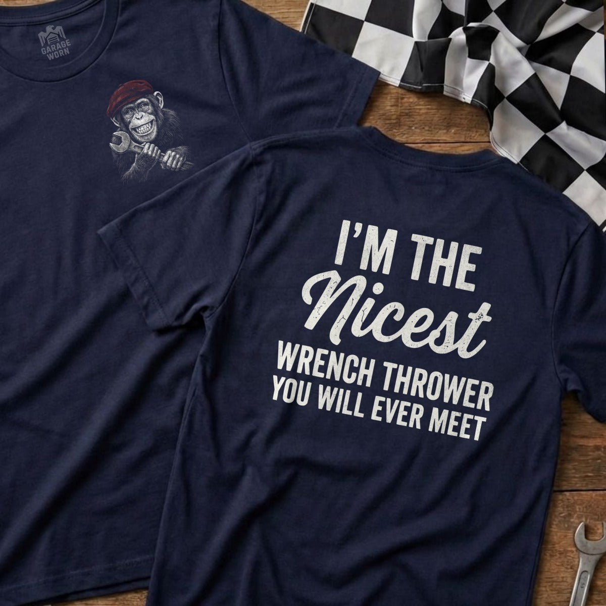 Navy t-shirt with monkey graphic on front, "I'm the nicest wrench thrower" text on back.