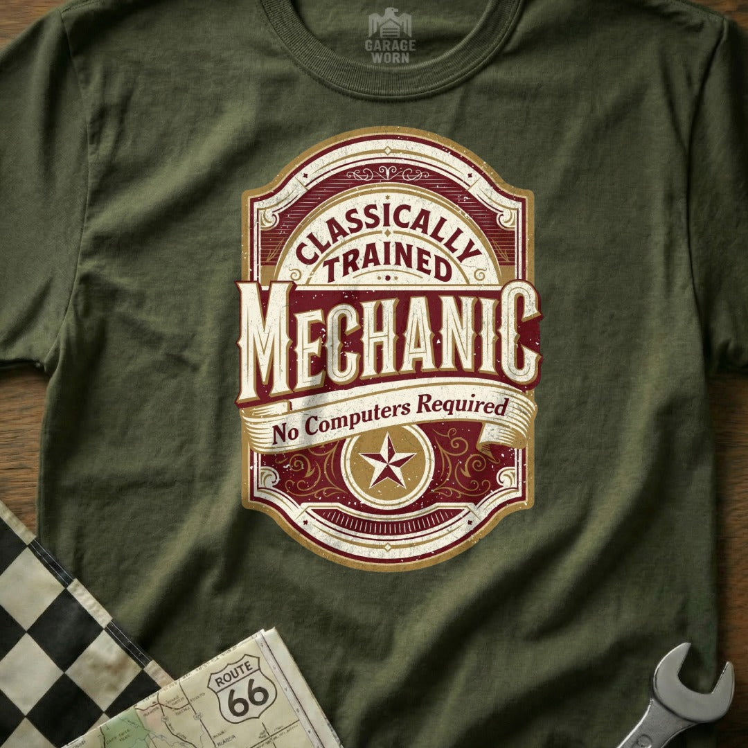 Olive green t-shirt with "Classically Trained Mechanic" text and star emblem.