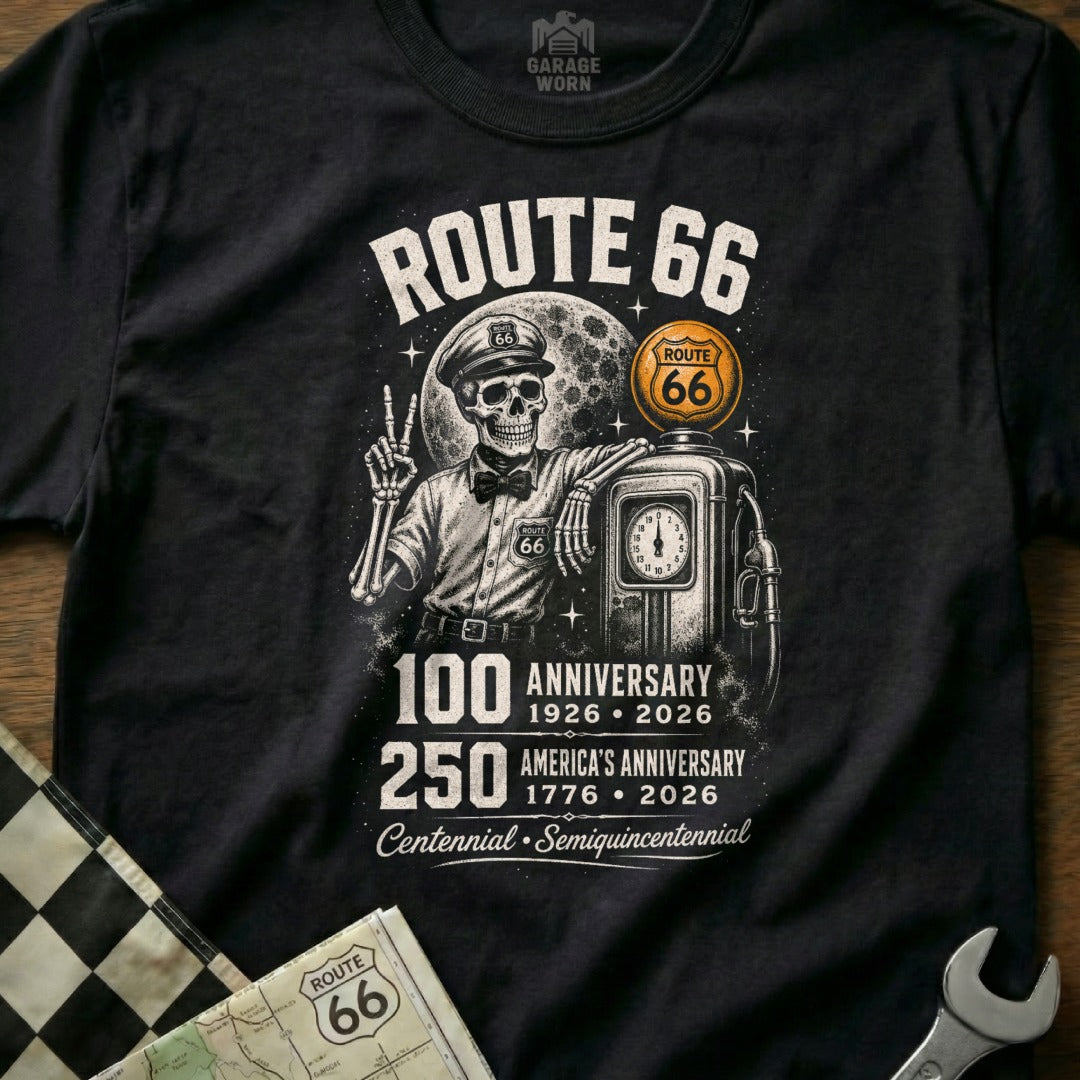 Skeleton in gas station uniform with Route 66 and anniversary text.