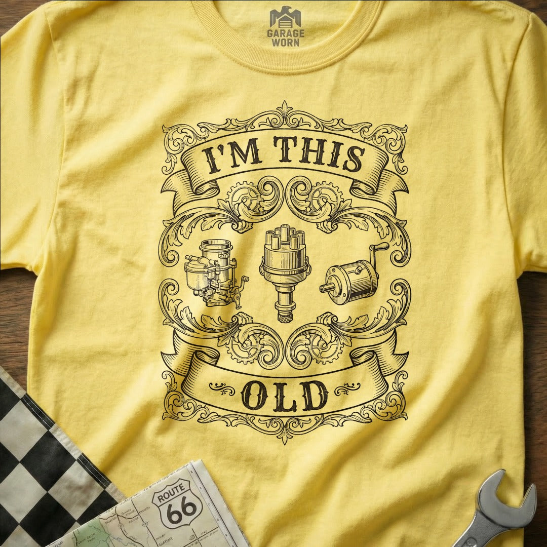 Yellow t-shirt with vintage car parts and "I'm This Old" text.
