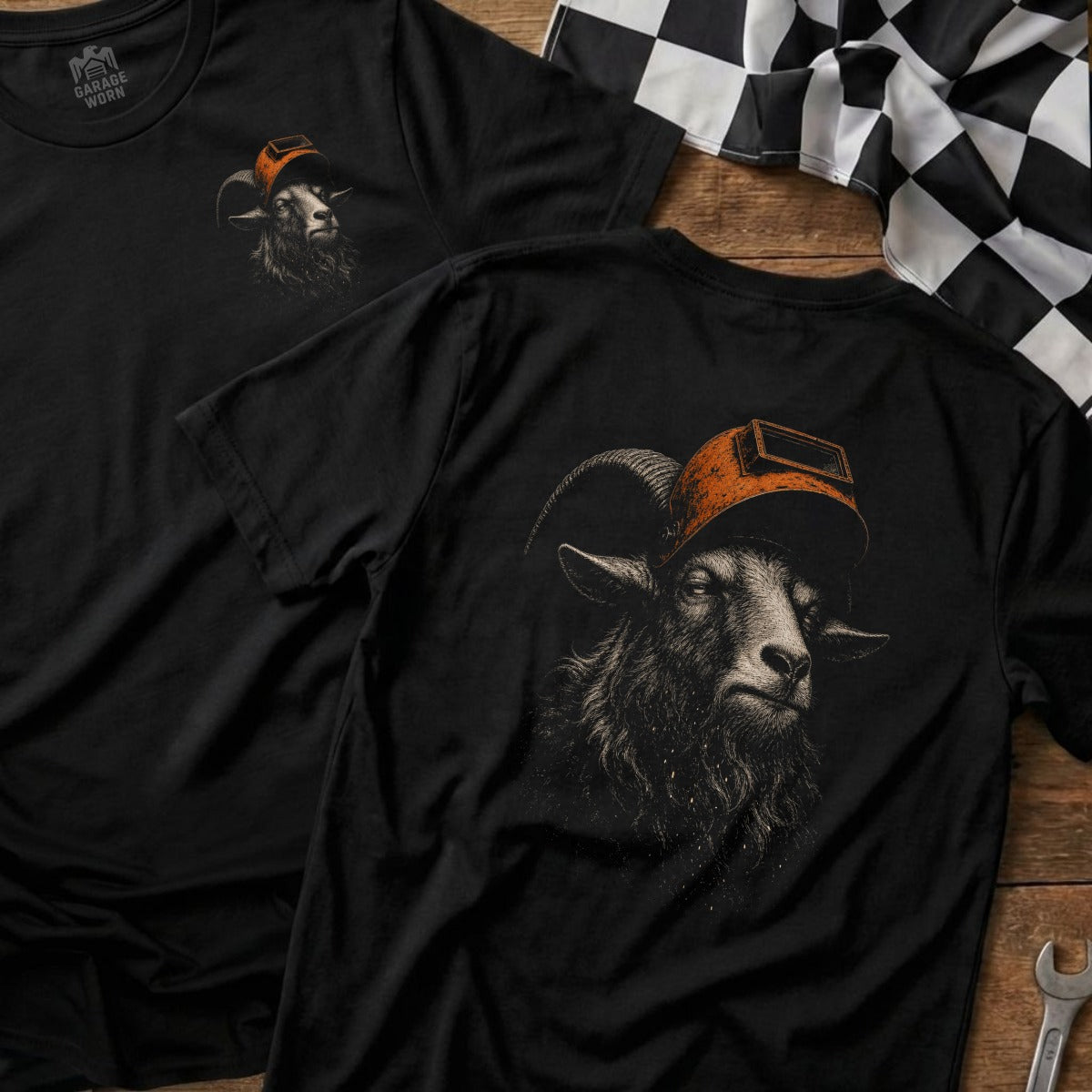 Black t-shirt with a realistic graphic of a ram wearing a welding mask.