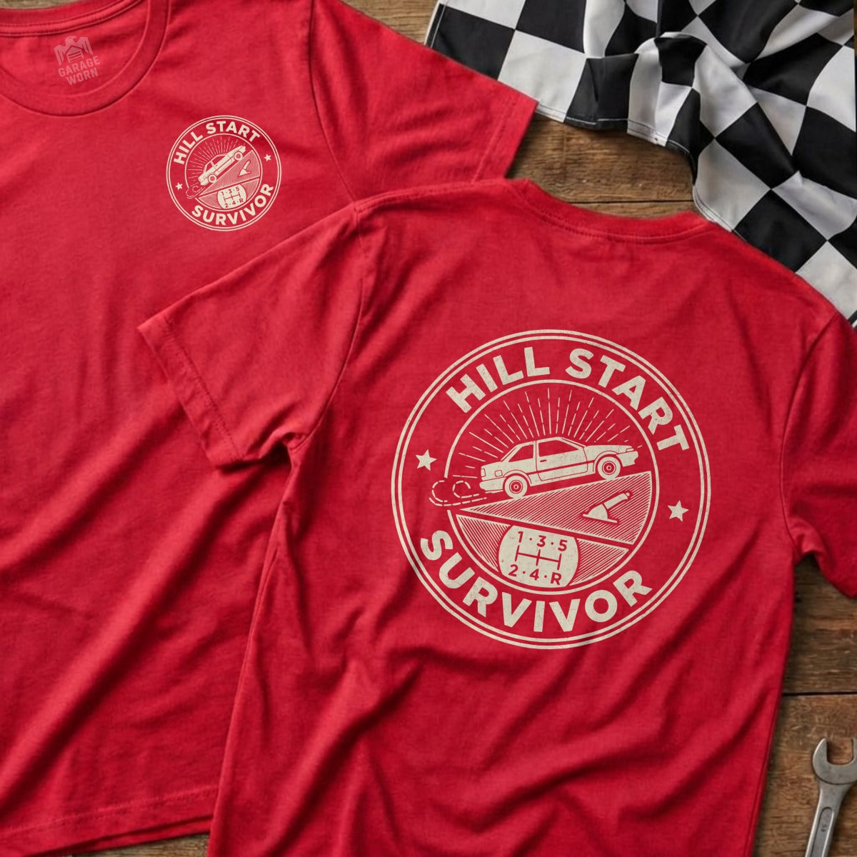 Red t-shirt with "Hill Start Survivor" text and gear diagram.