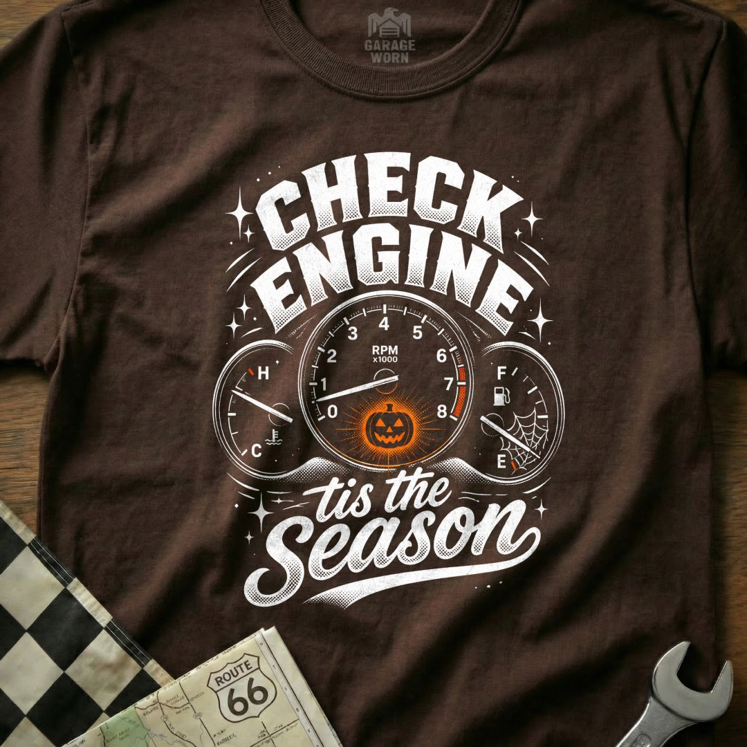 Brown t-shirt with "Check Engine tis the Season" text and Halloween gauges.