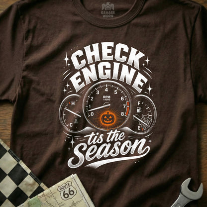 Brown t-shirt with "Check Engine tis the Season" text and Halloween gauges.