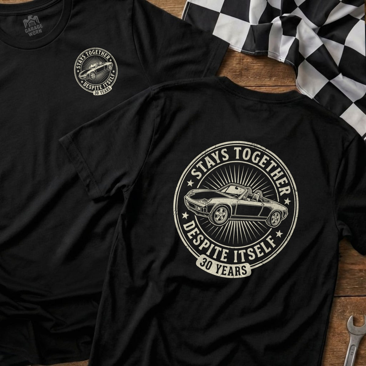 Black t-shirt with "Stays Together Despite Itself 30 Years" text and car graphic.