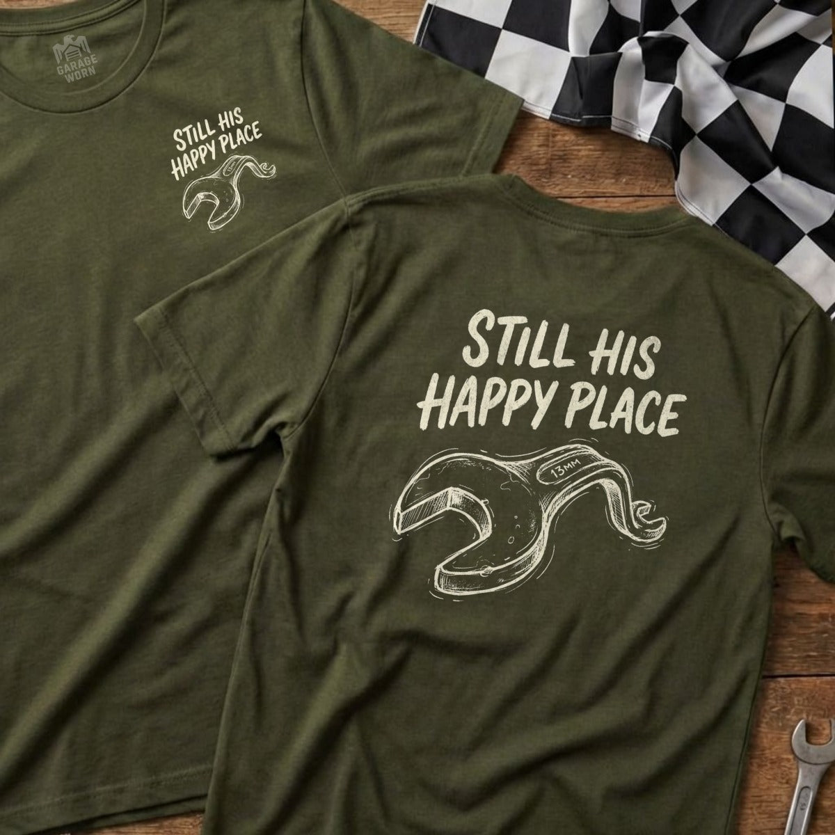 Olive green t-shirts with "Still His Happy Place" and wrench graphic.