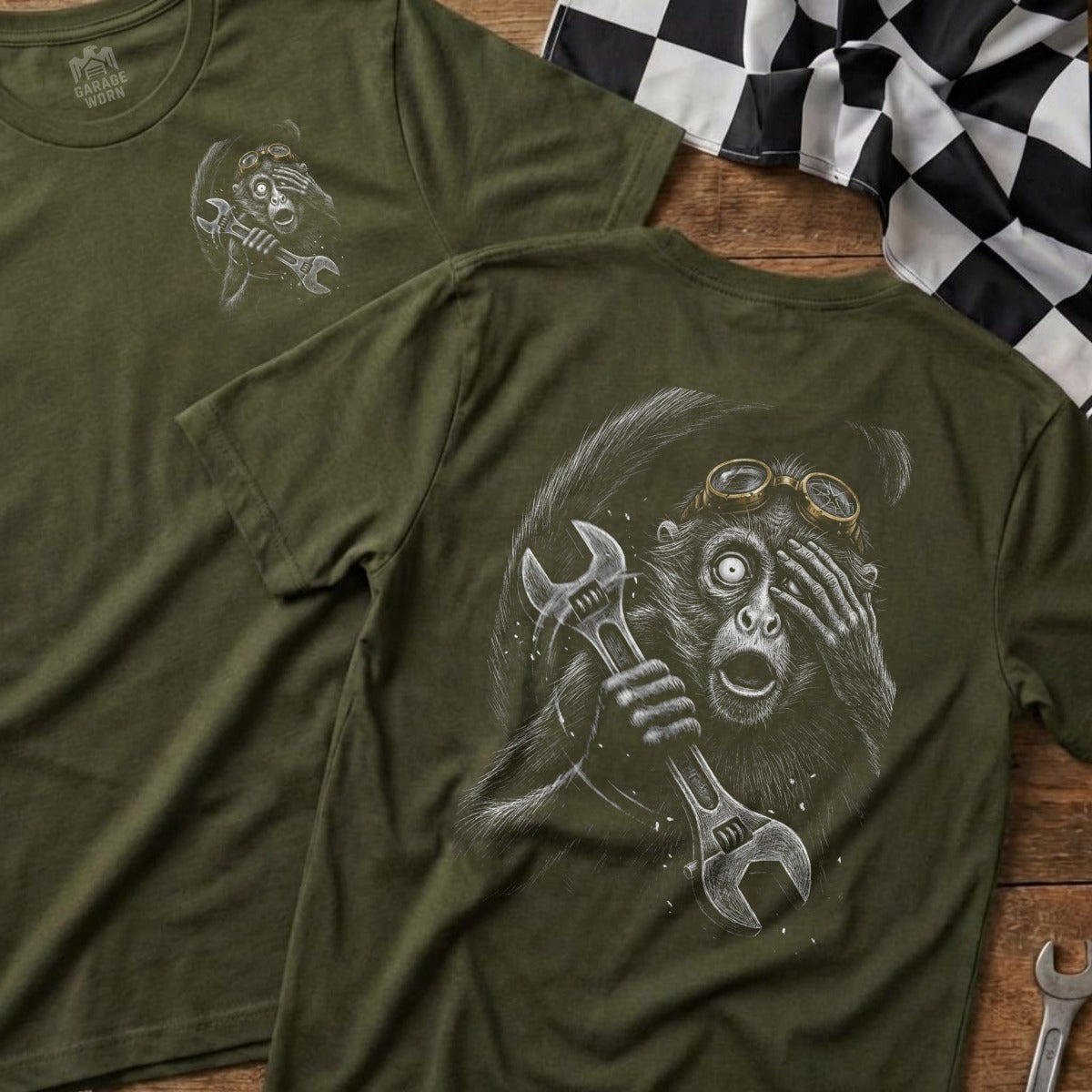 Olive green t-shirt with monkey mechanic design and "GARAGE WORN" logo.