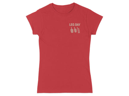Red t-shirt with "LEG DAY" text and pedal graphic.