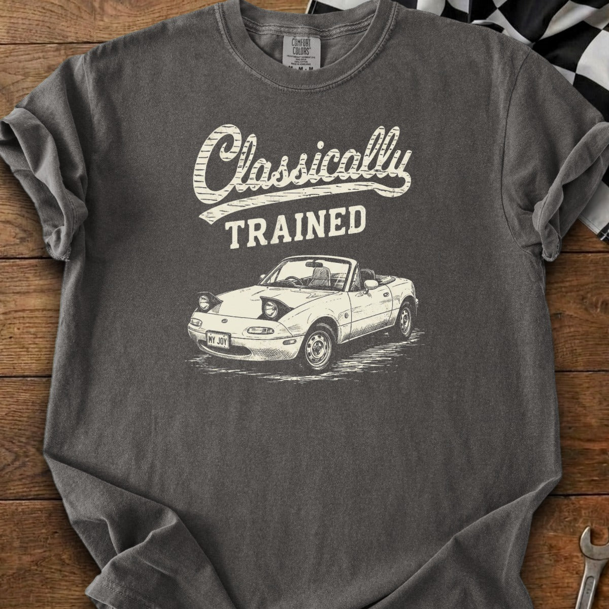 T-shirt with "Classically TRAINED" text and a sketch of a classic convertible car.