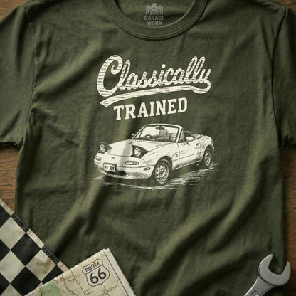Olive t-shirt with "Classically TRAINED" and a sketch of a white convertible Miata.