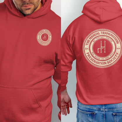 Red hoodie with a circular graphic featuring a manual transmission shift pattern and text.