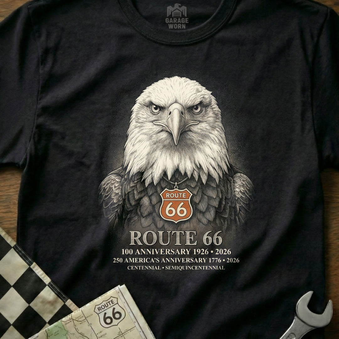 Black t-shirt with an eagle wearing a Route 66 necklace, text celebrates anniversaries.